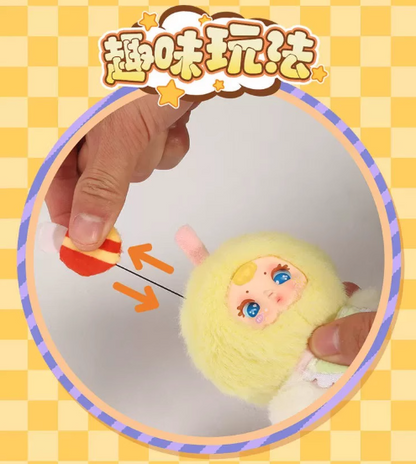 Close-up of scented Sugar Baby figure with pastel fruit outfit